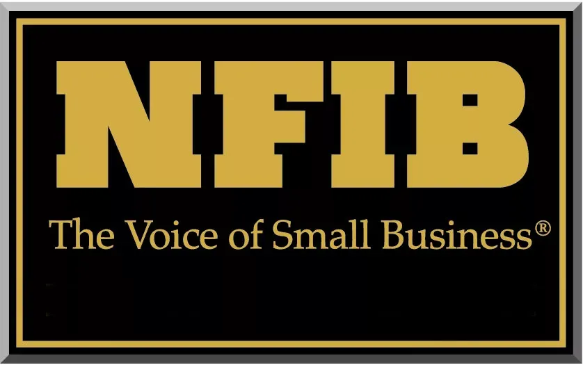 A black and gold sign that says nfib the voice of small business