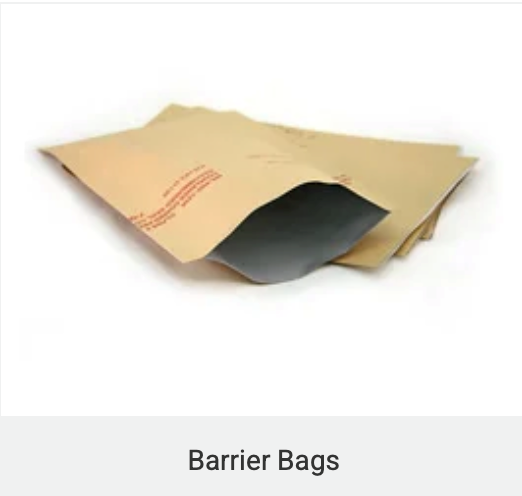 Brown barrier bags, open and stacked, on a white surface.