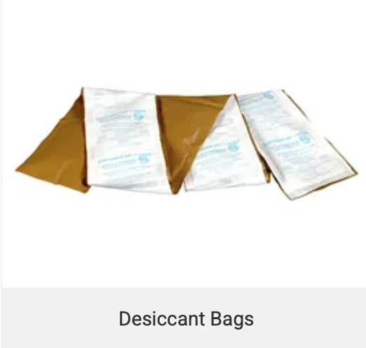 Desiccant bags, white packets, within a brown pouch, likely for moisture absorption.