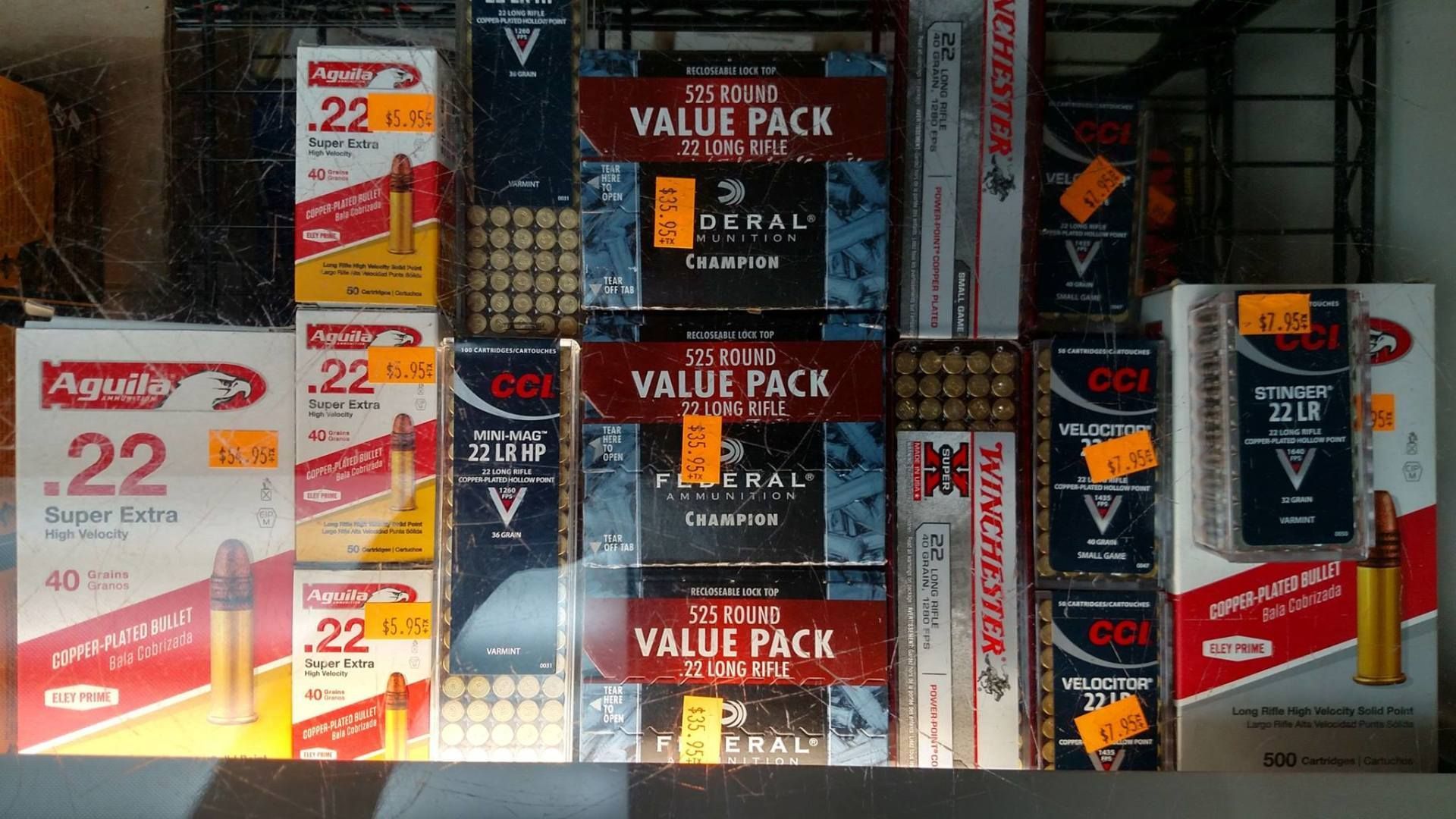 several boxes of ammunition are stacked on top of each other