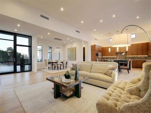 A living room with a couch and a coffee table.