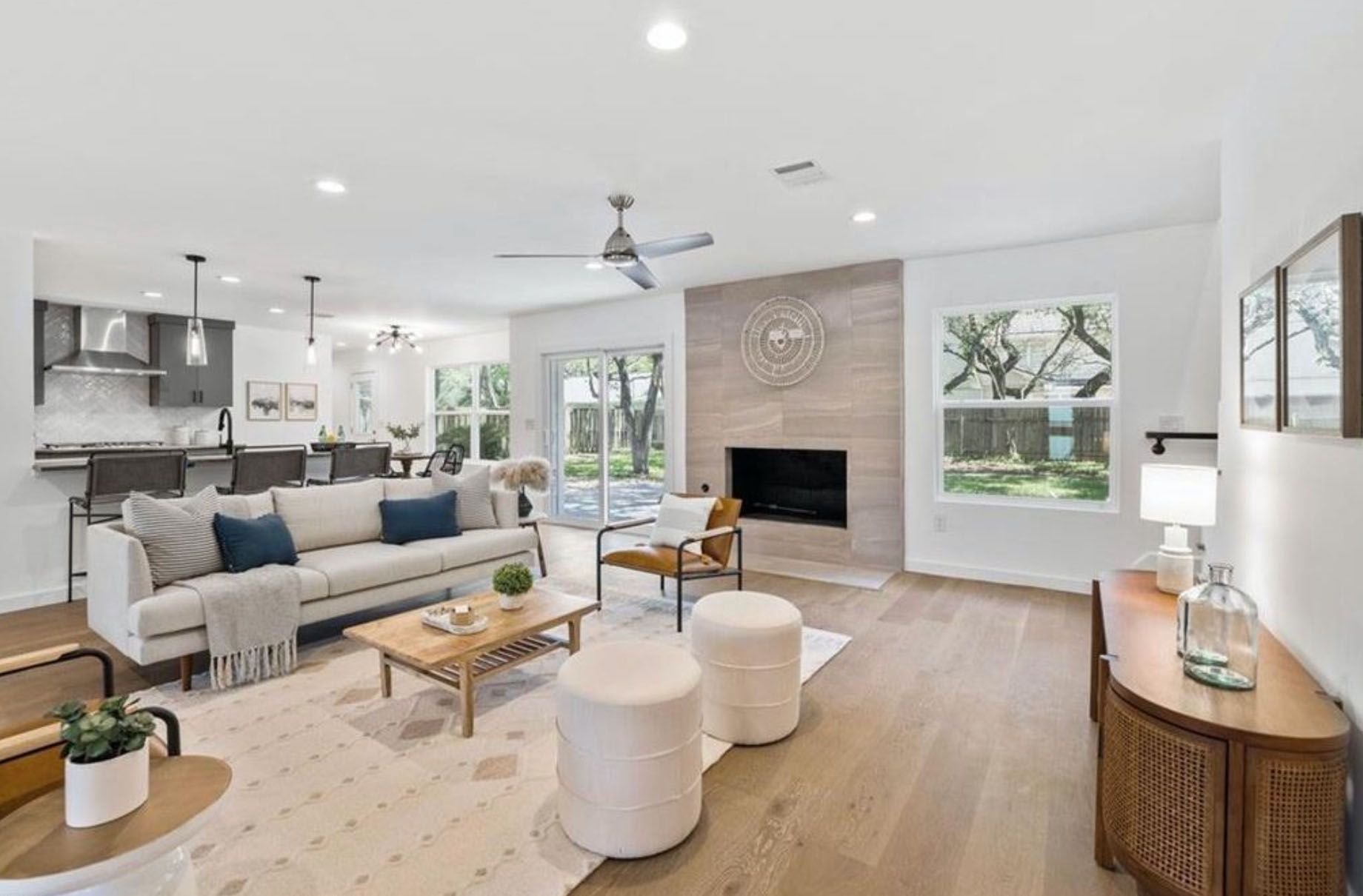 A living room filled with furniture and a fireplace.