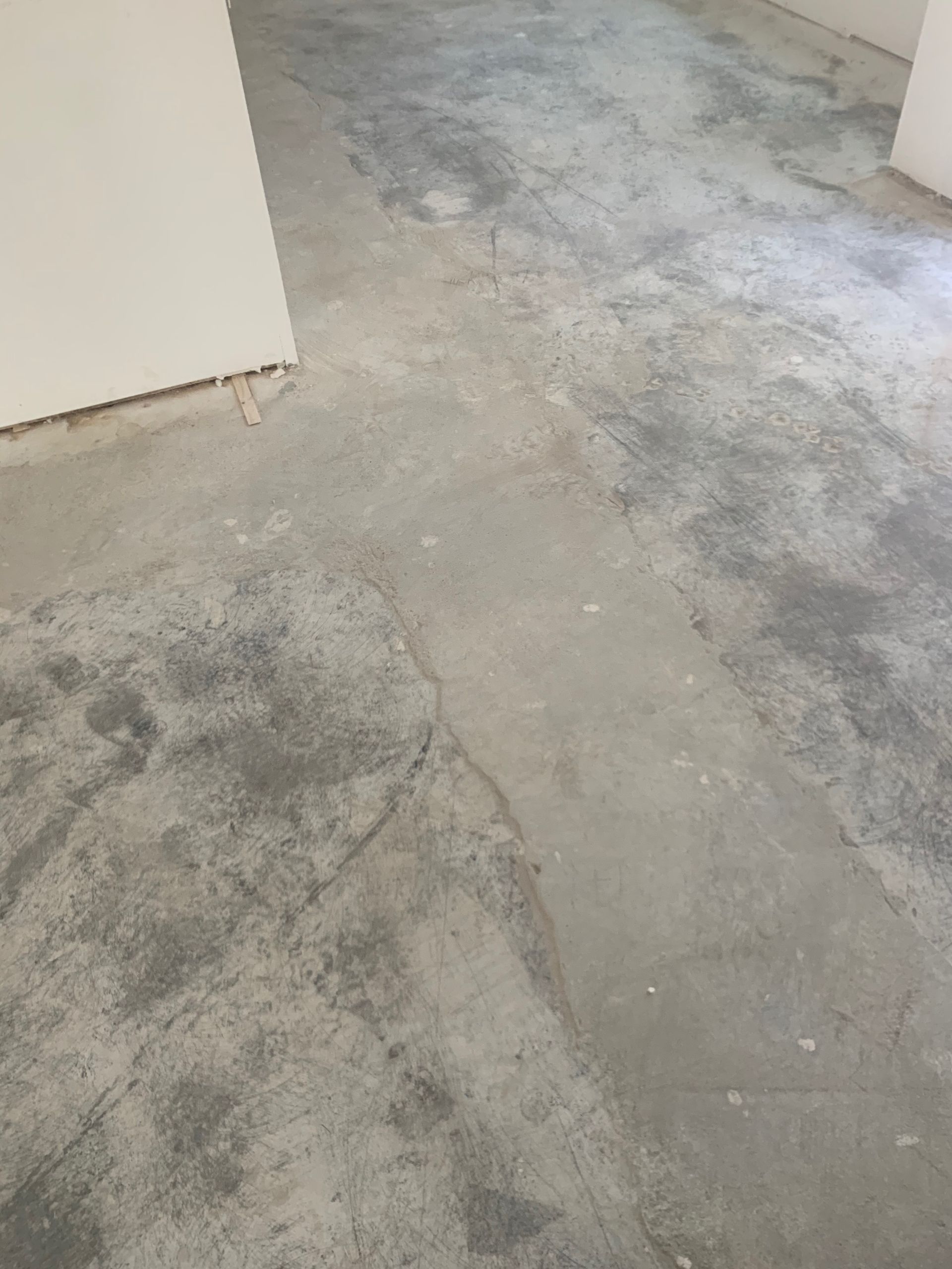 A close up of a concrete floor in a room.