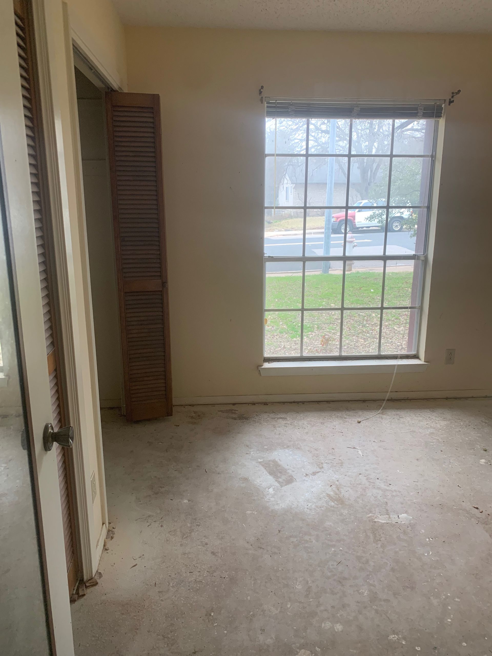 There is a large window in the middle of the room.