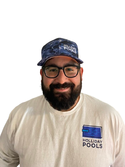 A man with a beard and glasses is wearing a hat and a white shirt.