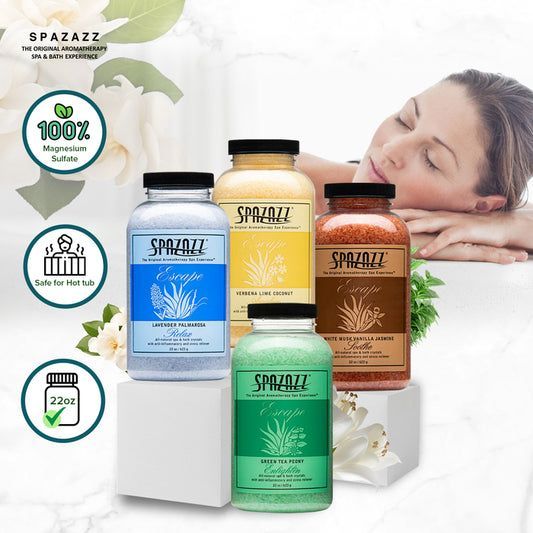 A woman is laying in a bathtub surrounded by bottles of spazzazz