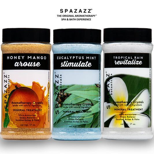 Three bottles of spazz bath salts are lined up next to each other