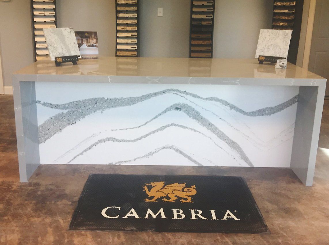 A counter top with a cambria logo on it