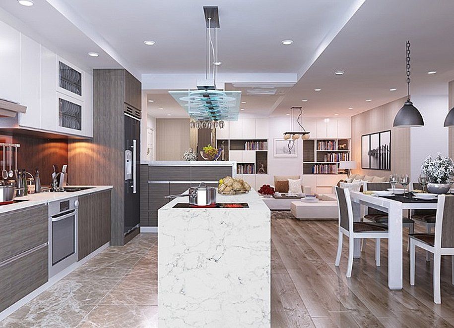 A kitchen with a large island in the middle and a dining table and chairs.