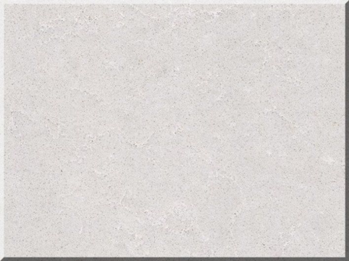 A white tile with a gray border is sitting on a white surface.