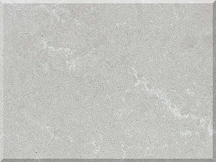 A close up of a gray granite counter top on a white background.