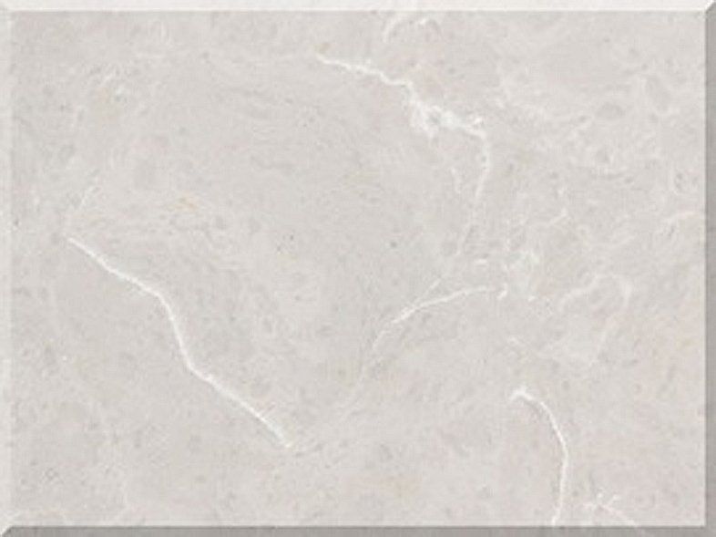 A close up of a white tile with a marble texture.