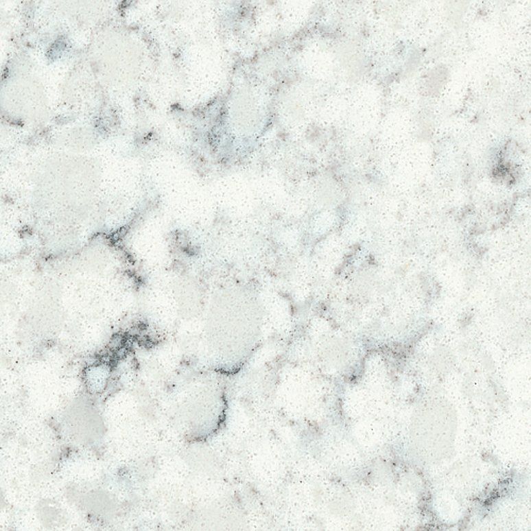 A close up of a white marble counter top.