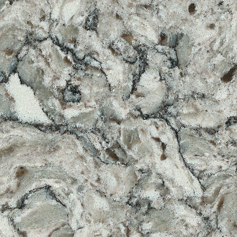 A close up of a granite counter top with a marble texture