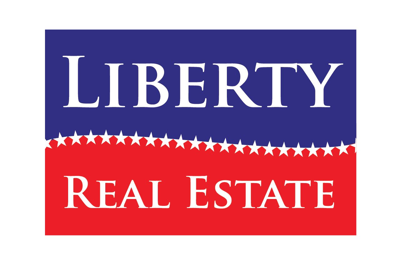 A red white and blue logo for liberty real estate