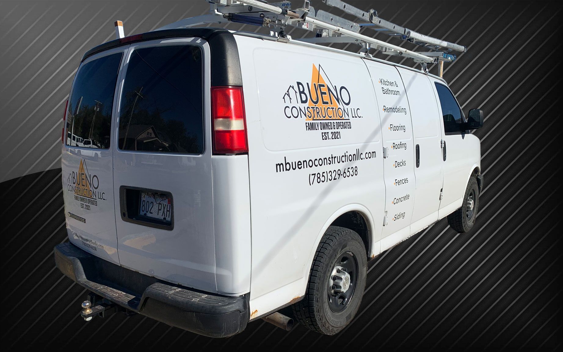 A white van with the word buena on the side