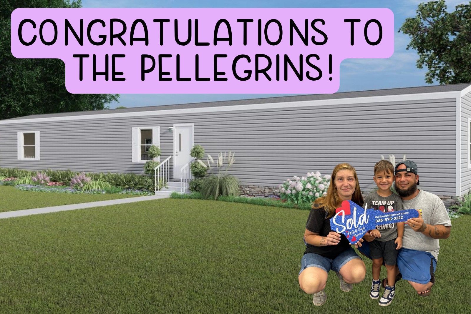 Two men are standing in a kitchen holding a sold sign