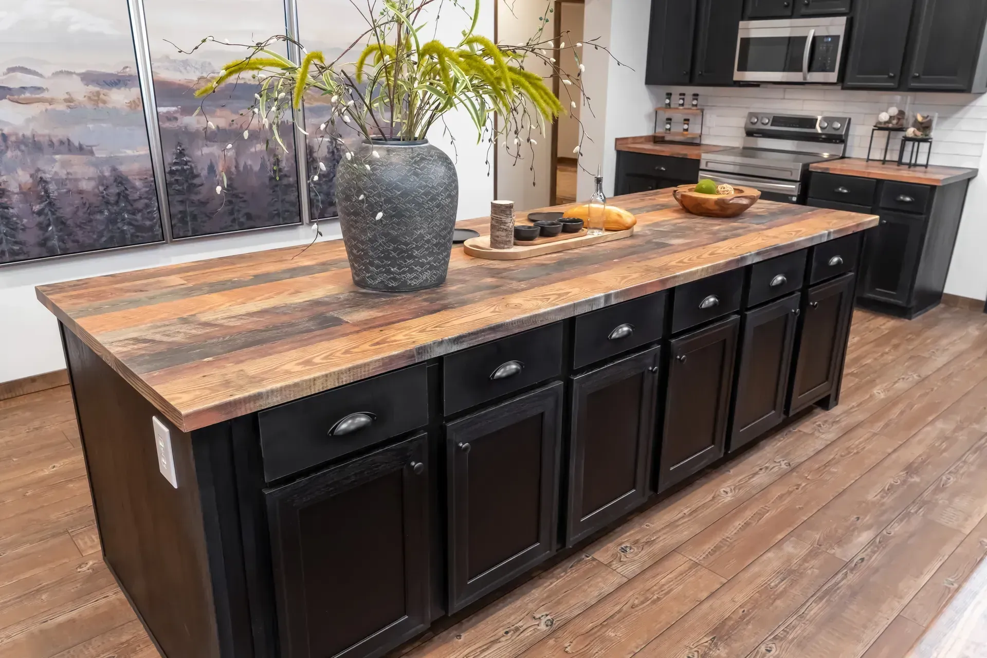 There is a large island in the middle of the kitchen.