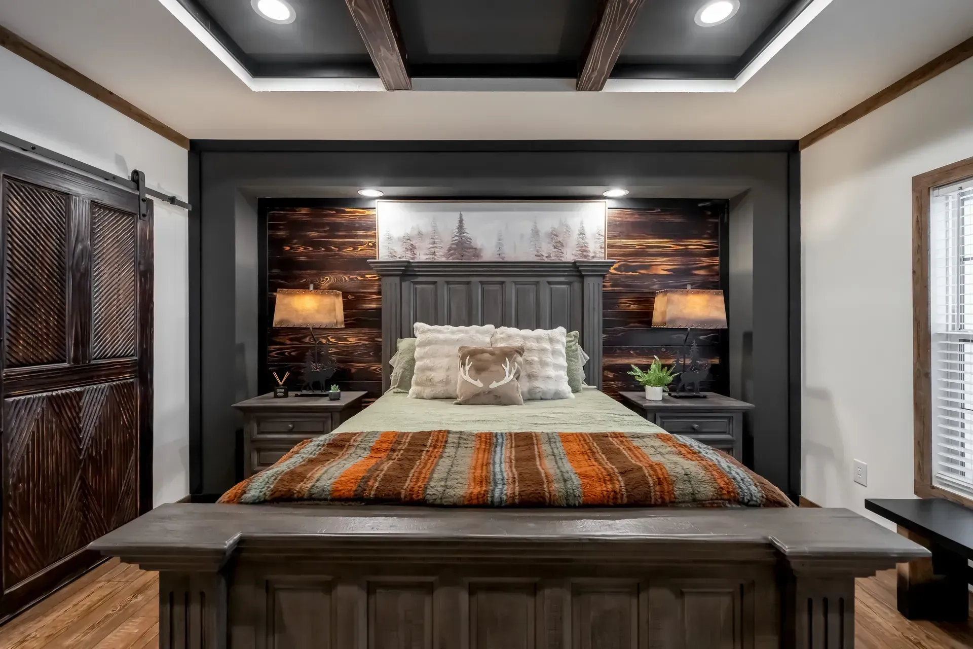 There is a large bed in the middle of the room.