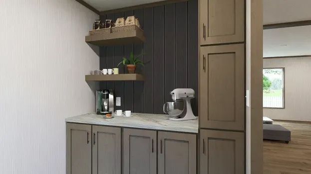 Kitchenette with brown cabinets, shelves, and appliances. Grey wall paneling and white countertops.