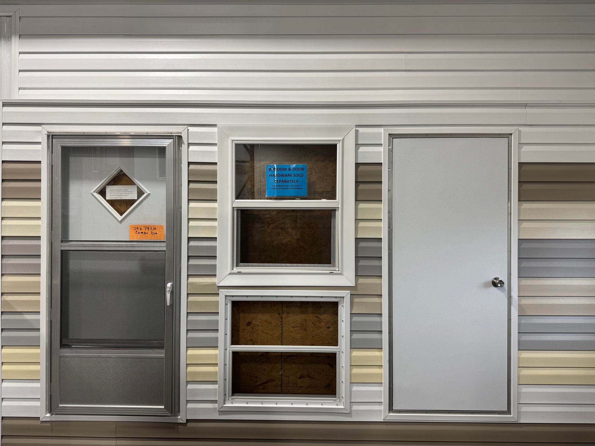 A small house with a door and two windows