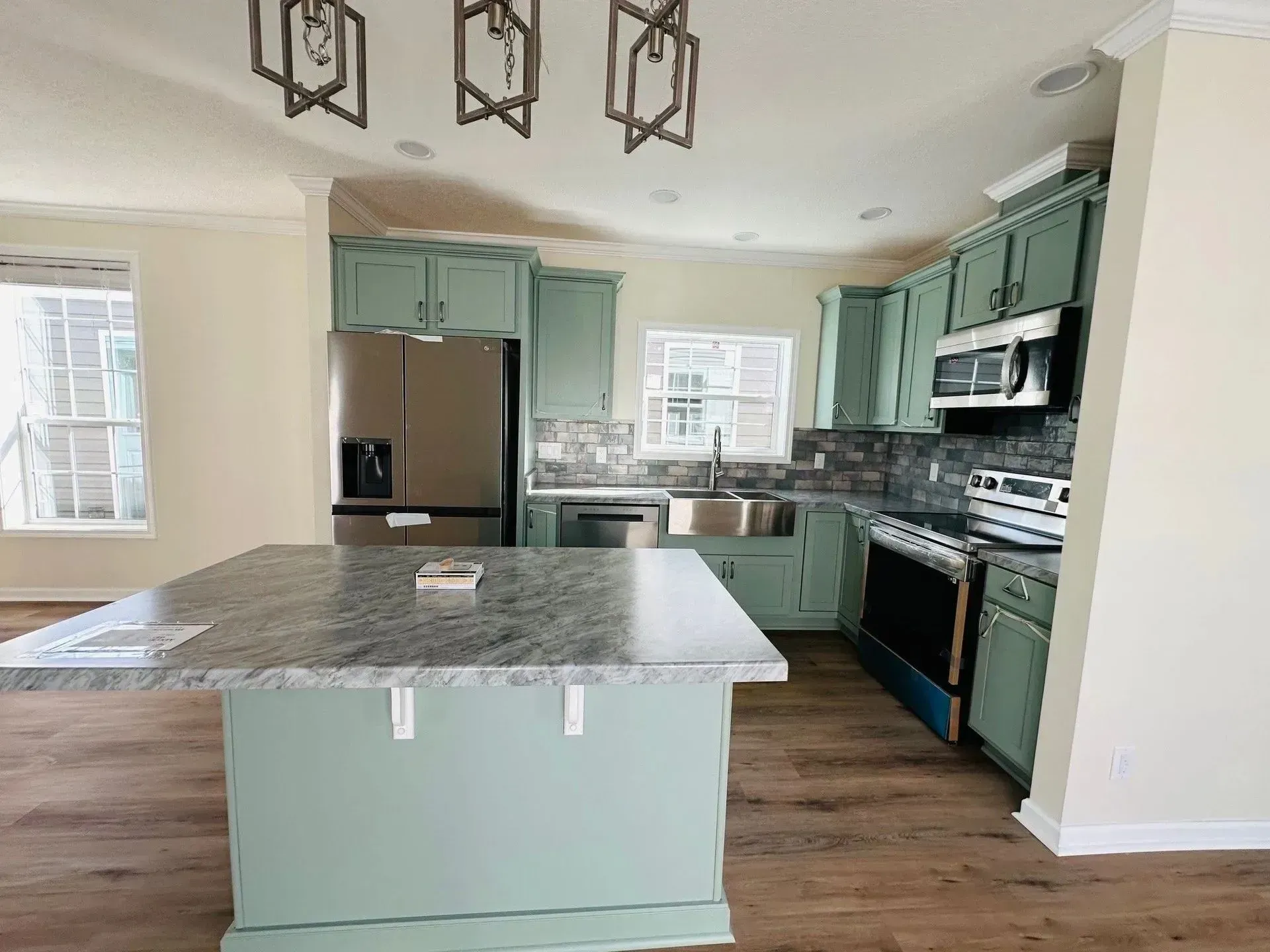 There is a large island in the middle of the kitchen