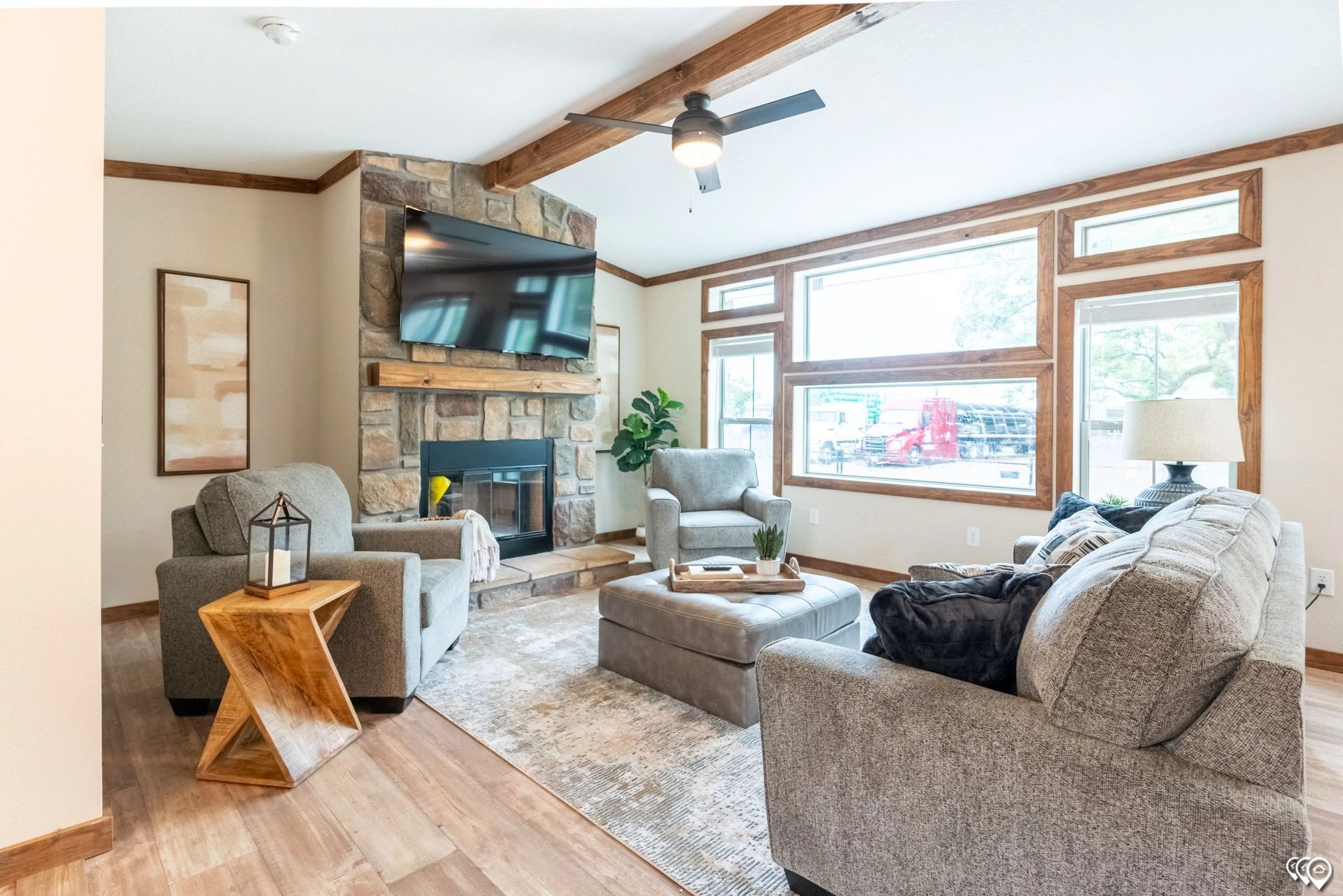 A living room filled with furniture and a fireplace.