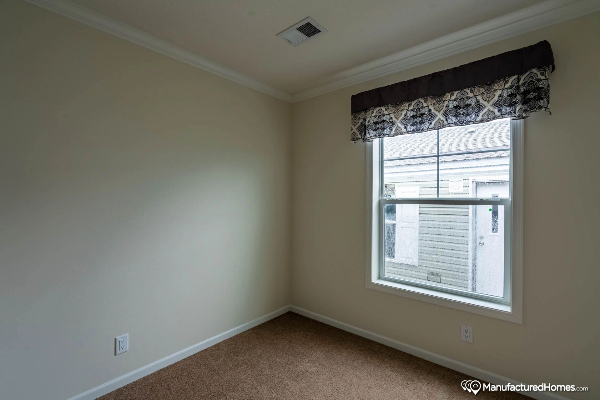 There is a large window in the middle of the room.