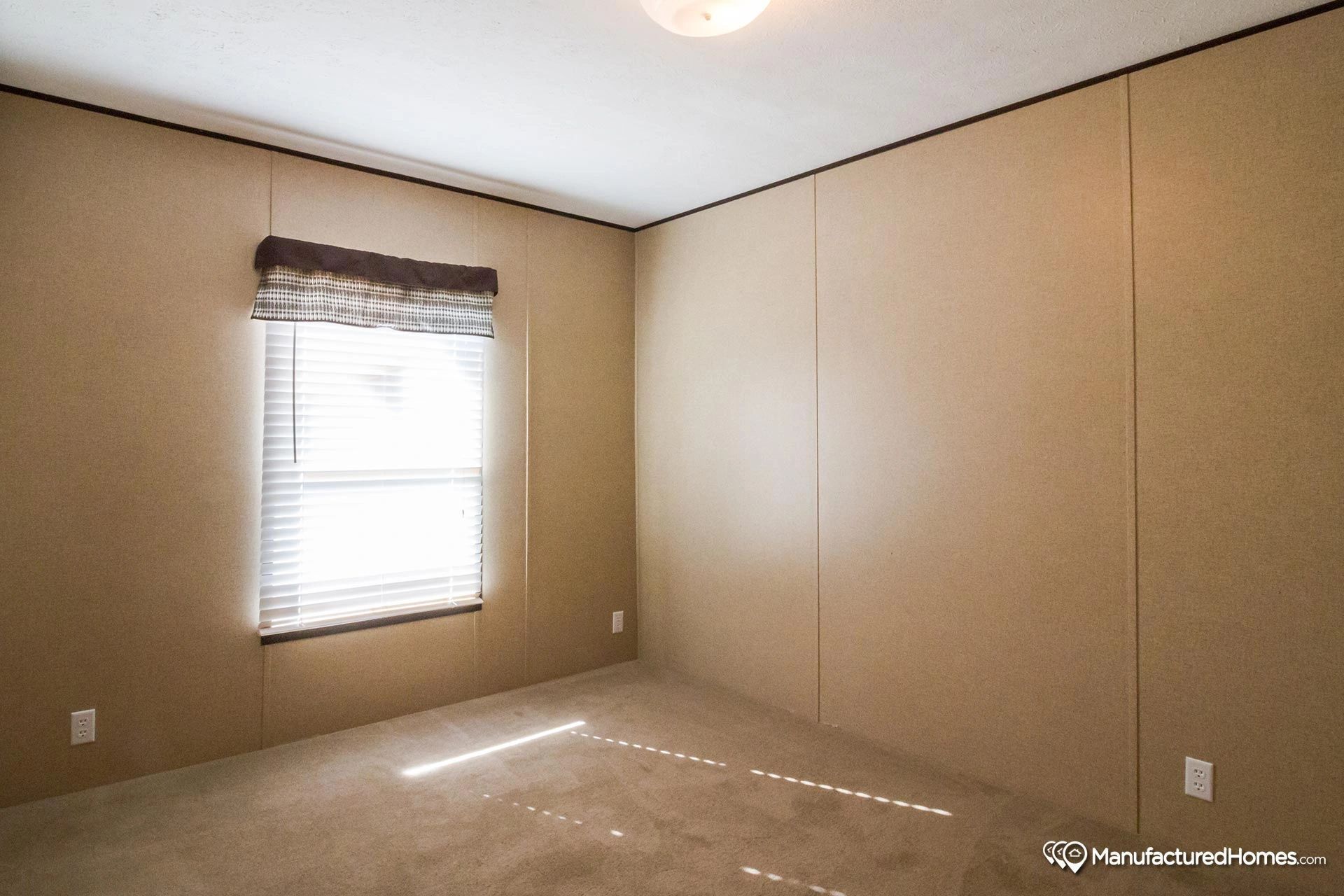 There is a window in the middle of the room.