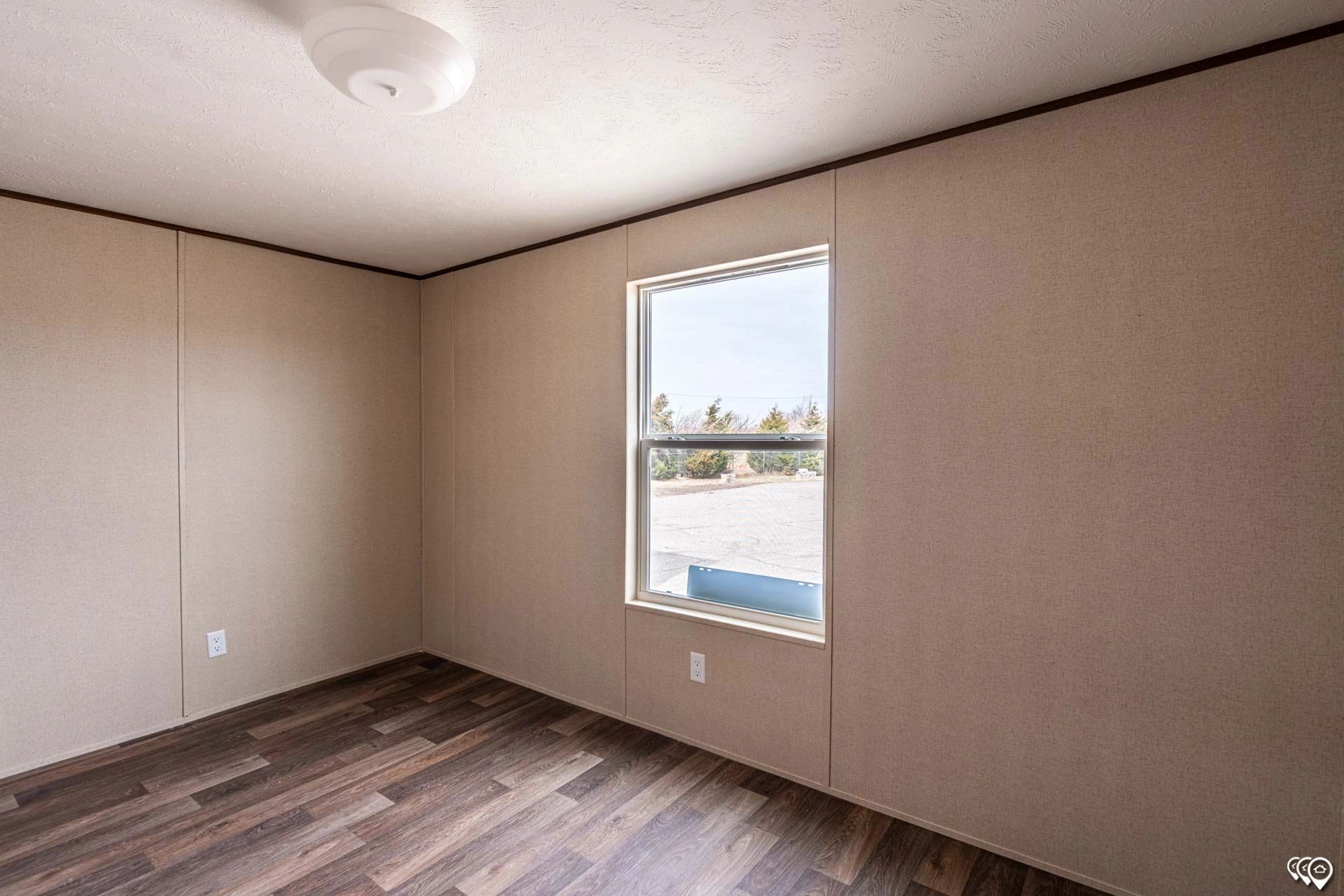 There is a large window in the middle of the room.