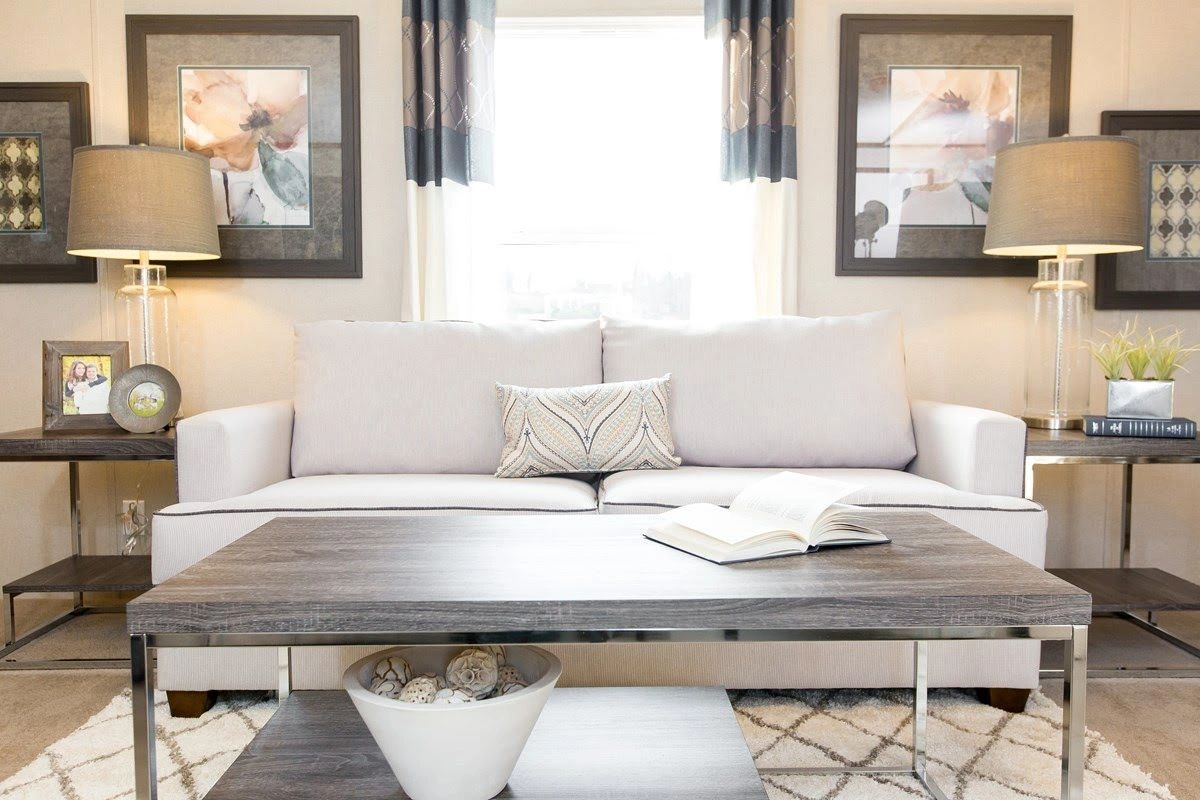 A living room with a couch and a coffee table