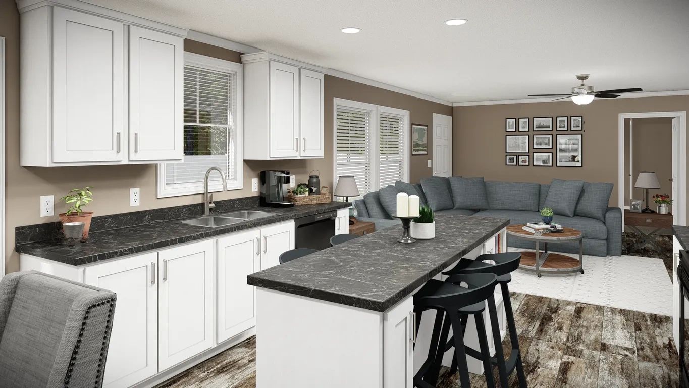 An artist 's impression of a kitchen and living room in a mobile home.