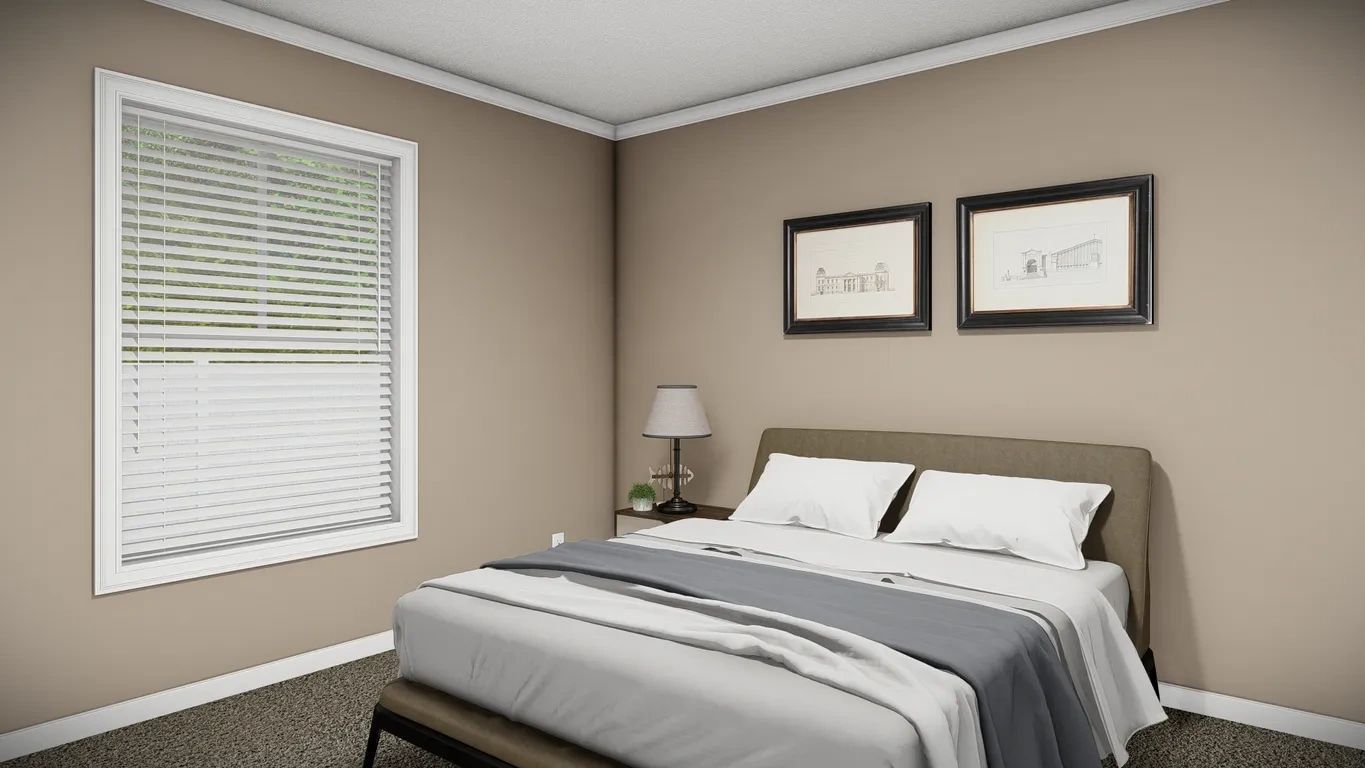 A bedroom with a bed , two windows and a lamp.