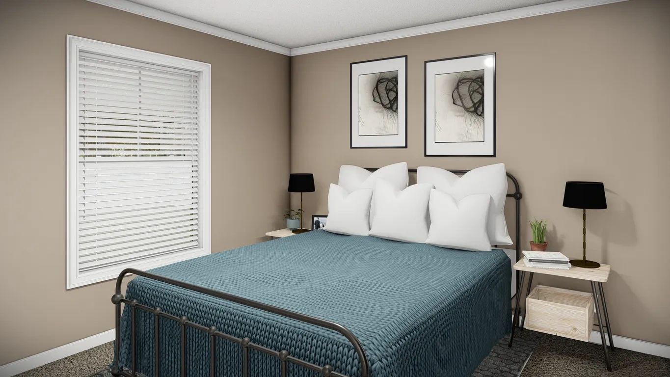 A bedroom with a bed , nightstand , lamps and two windows.