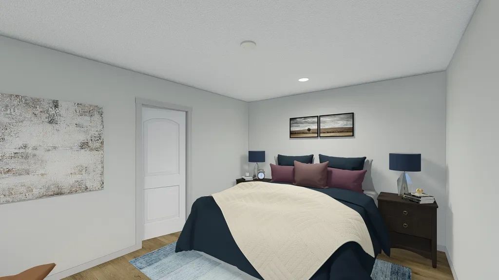 A bedroom with a bed , nightstand , and lamps.