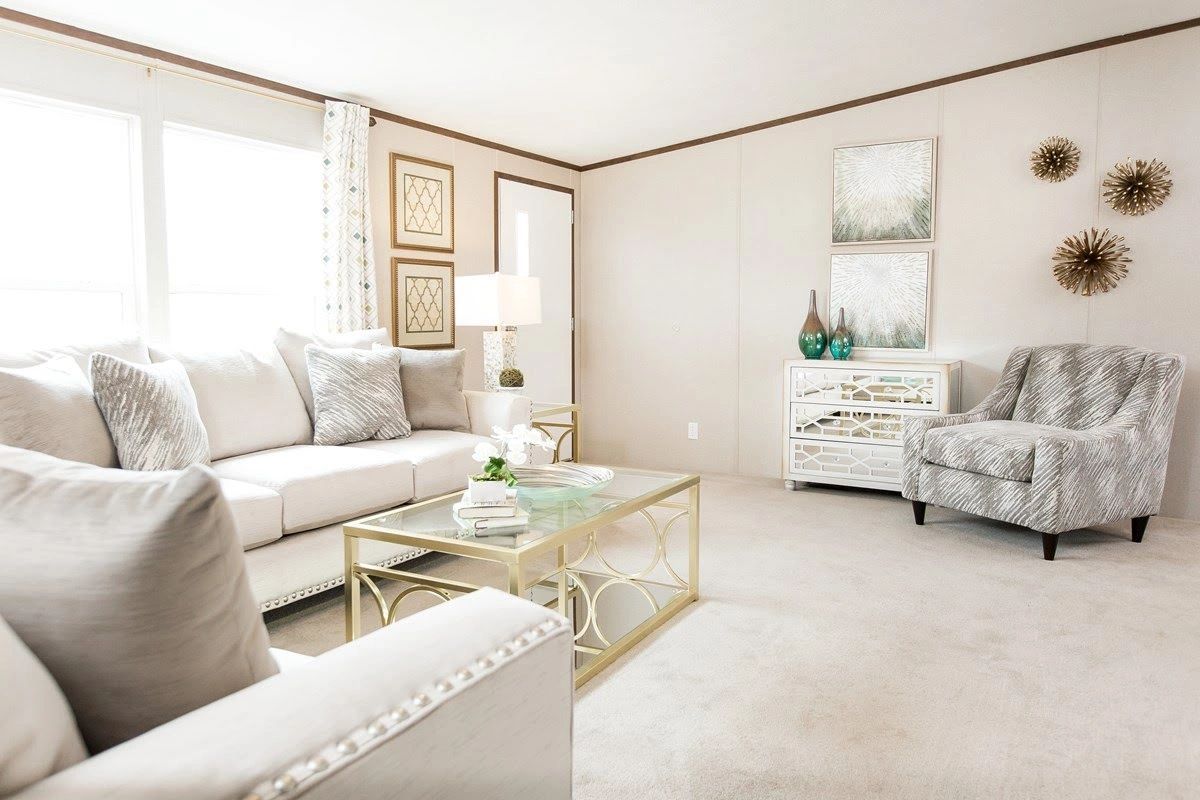 A living room filled with furniture and a coffee table.