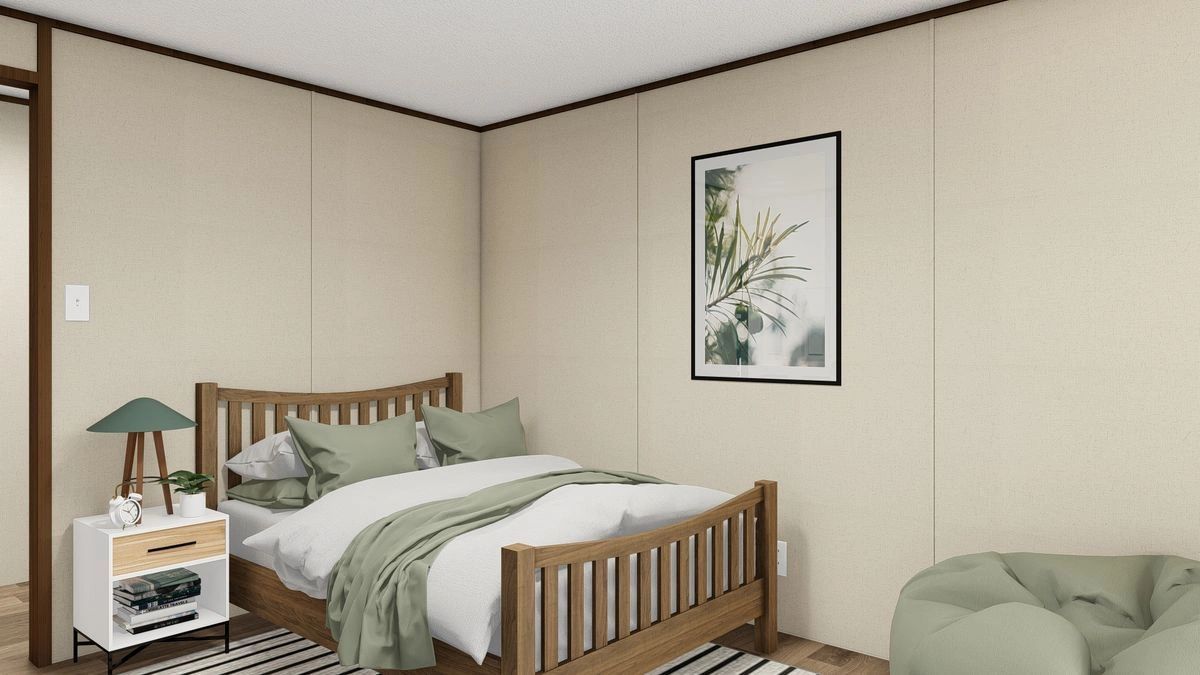 A bedroom with a bed , nightstand , and bean bag chair.