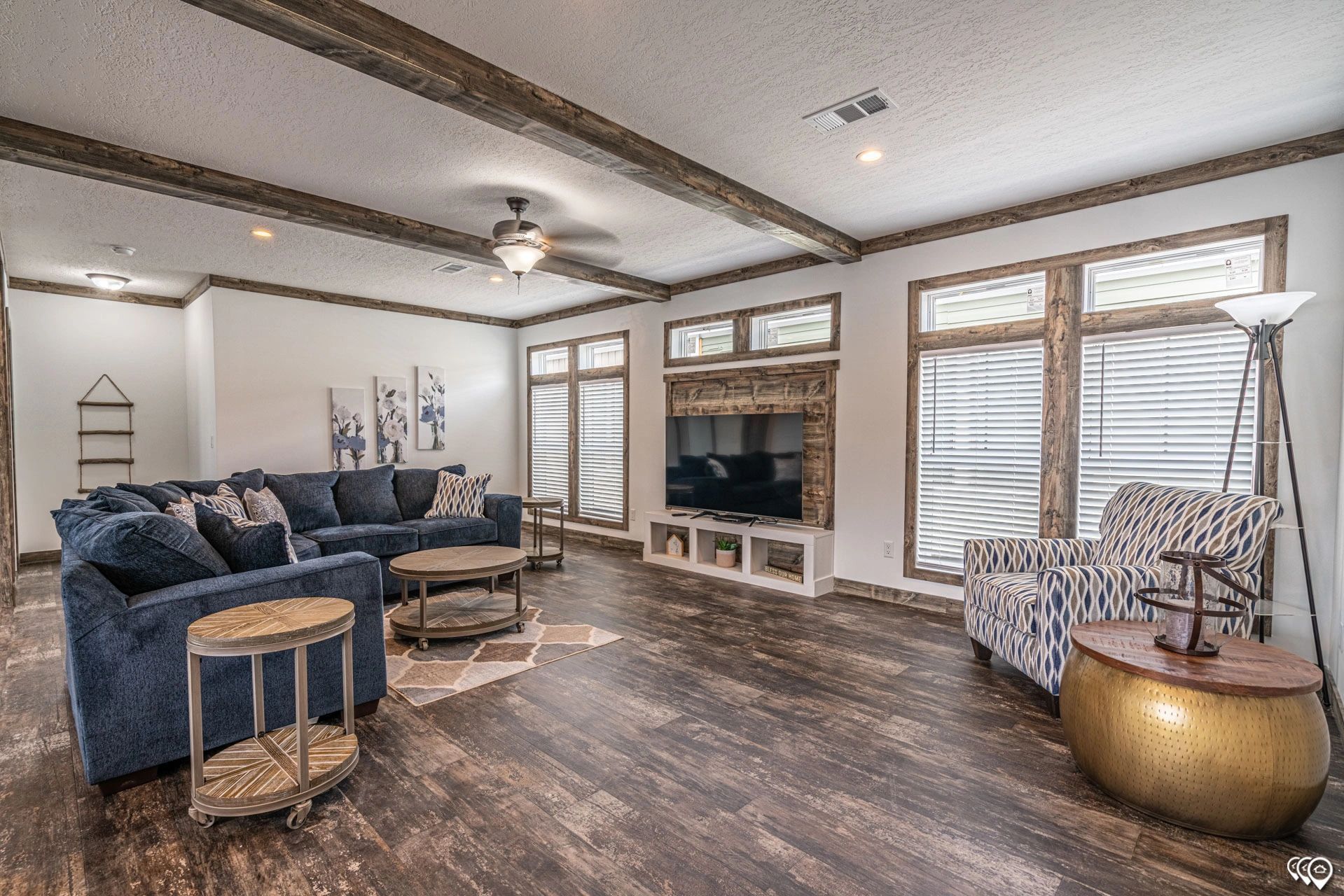 A living room filled with furniture and a flat screen tv.