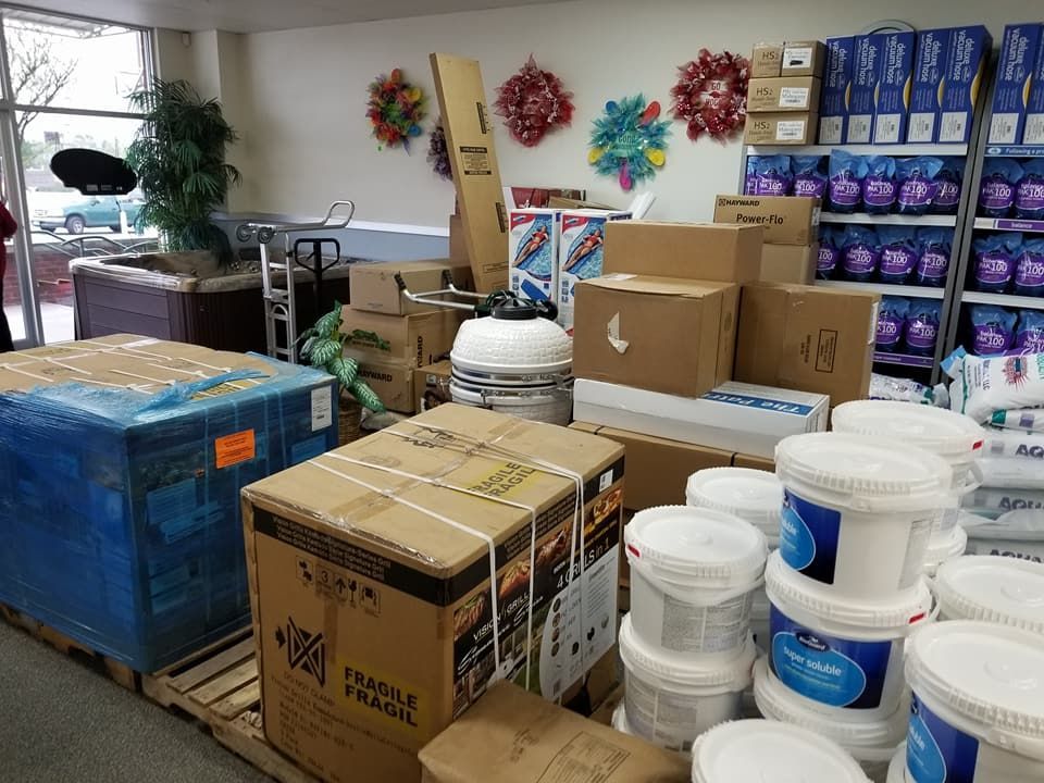 A room filled with lots of boxes and buckets