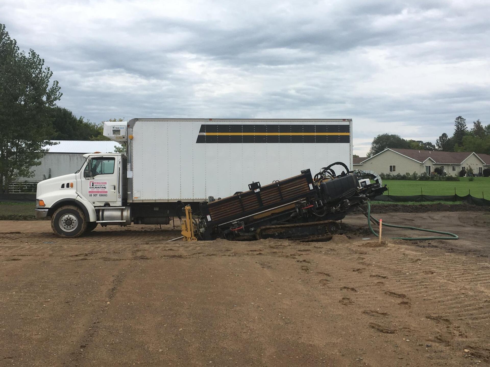 Ferguson Brothers Excavating Inc truck and machine