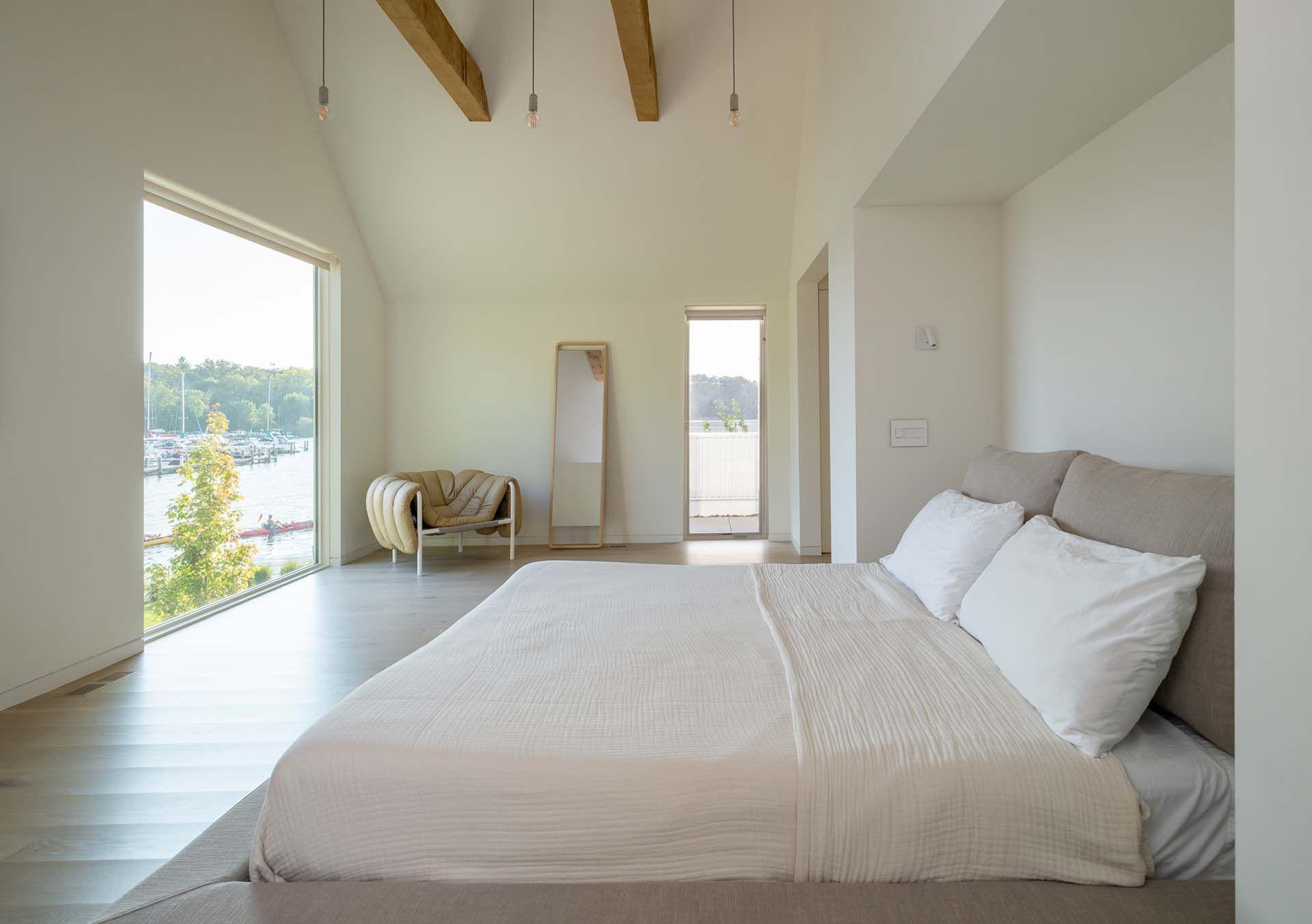 There is a large bed in the middle of the room.