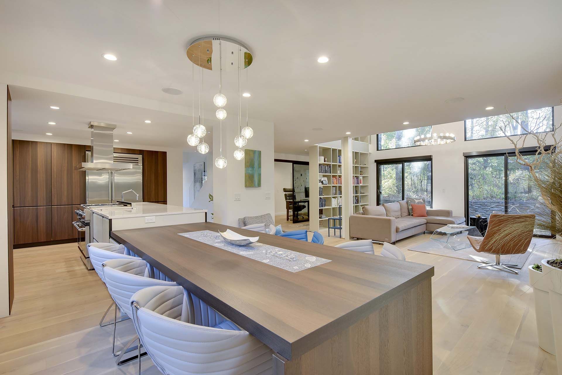 There is a long table in the middle of the room.