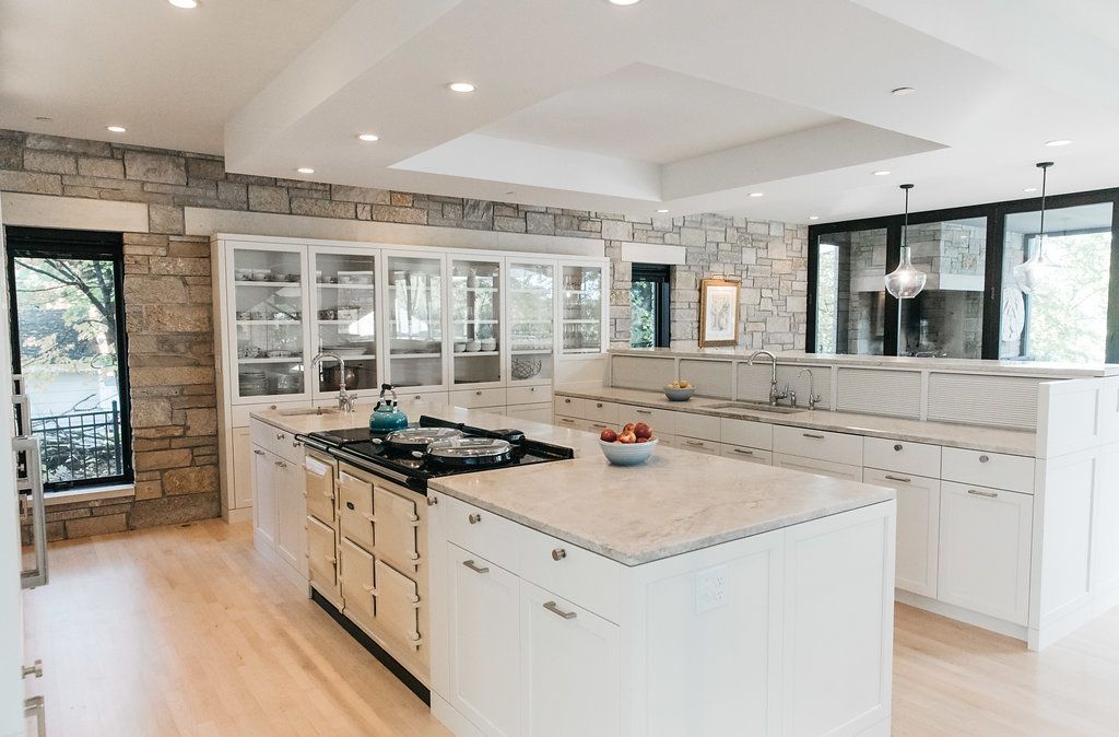 There is a large island in the middle of the kitchen.