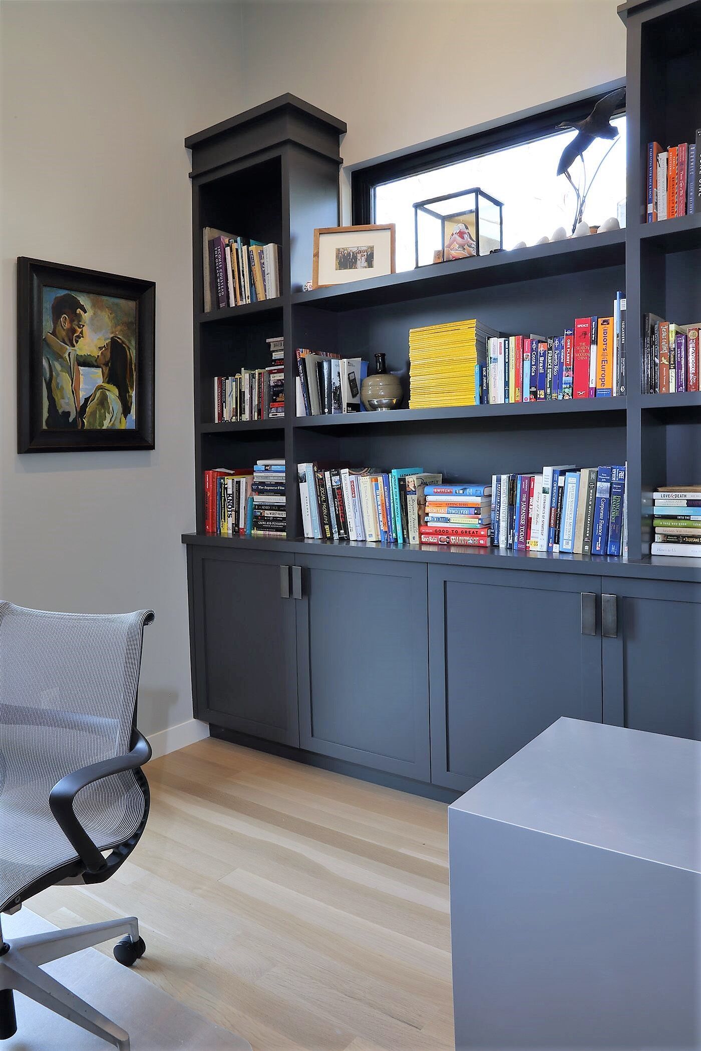 There are many books on the shelves in this room.