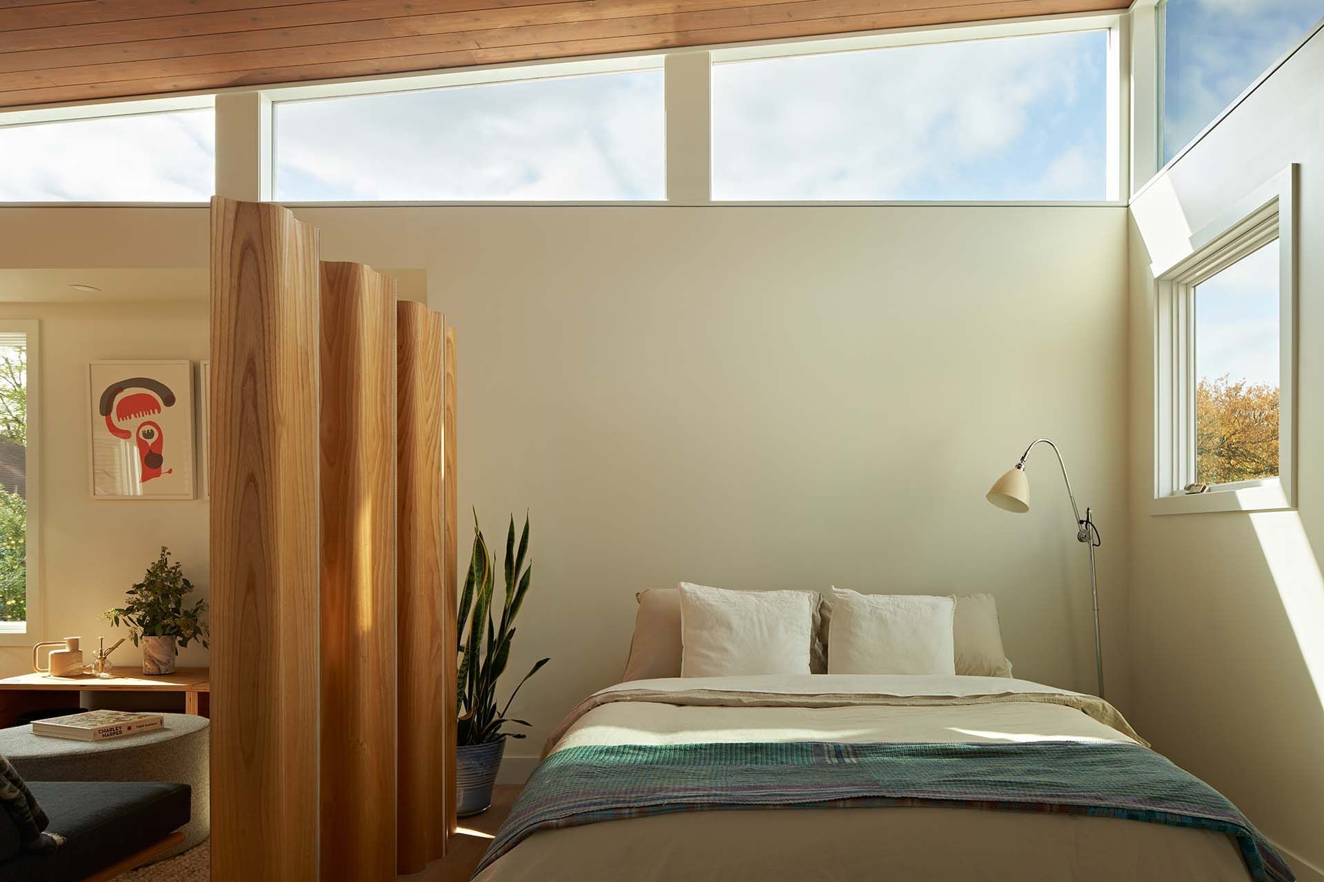 There is a bed in the middle of the room.