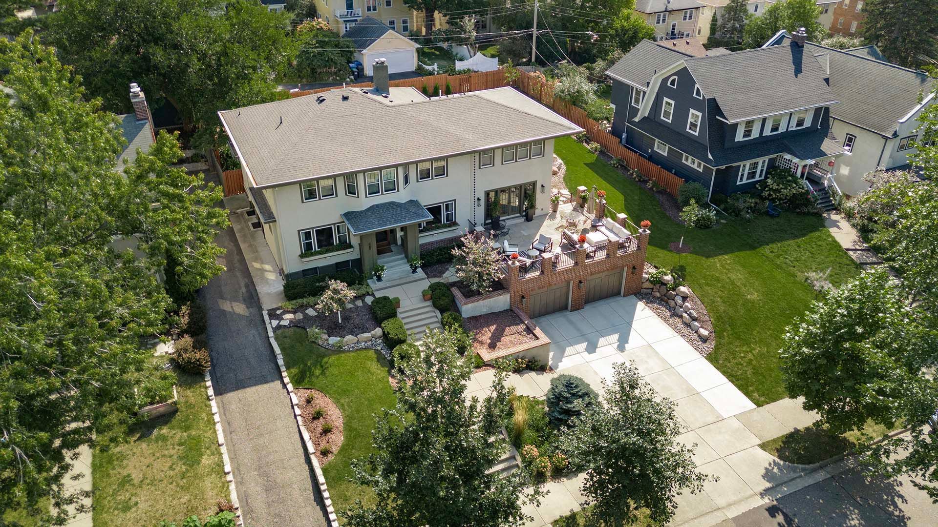 An aerial view of a house in a residential area