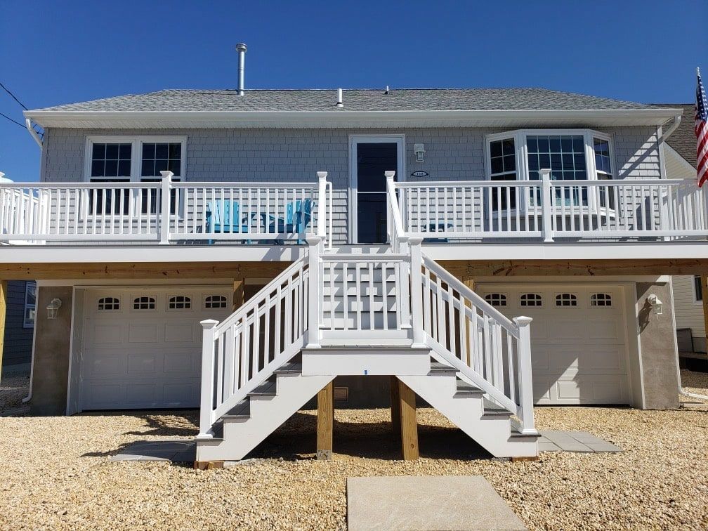 A house with stairs leading up to the second floor