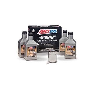 A box of amsoil vtwin oil change kit with four bottles of oil and a filter.