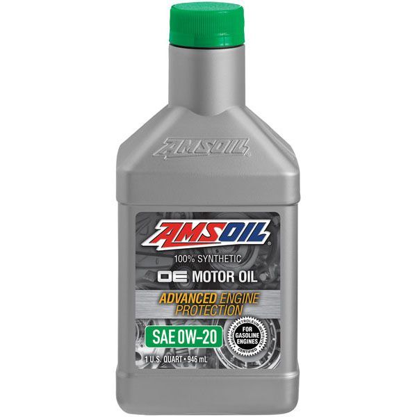 A bottle of amsoil motor oil with a green cap