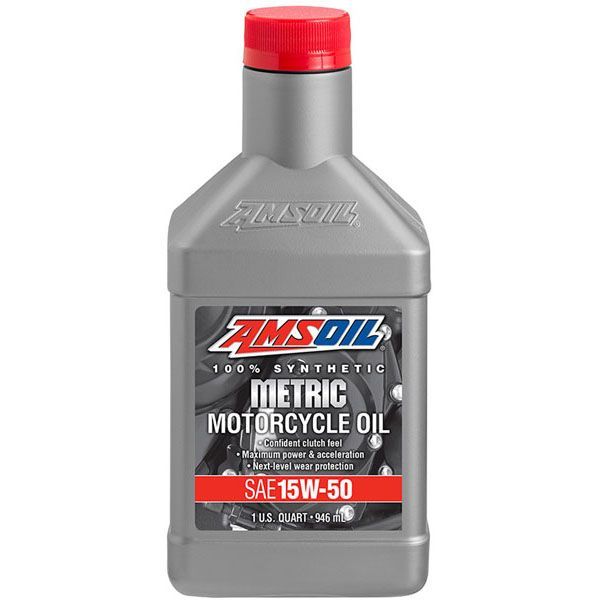 A bottle of amsoil metric motorcycle oil with a red cap